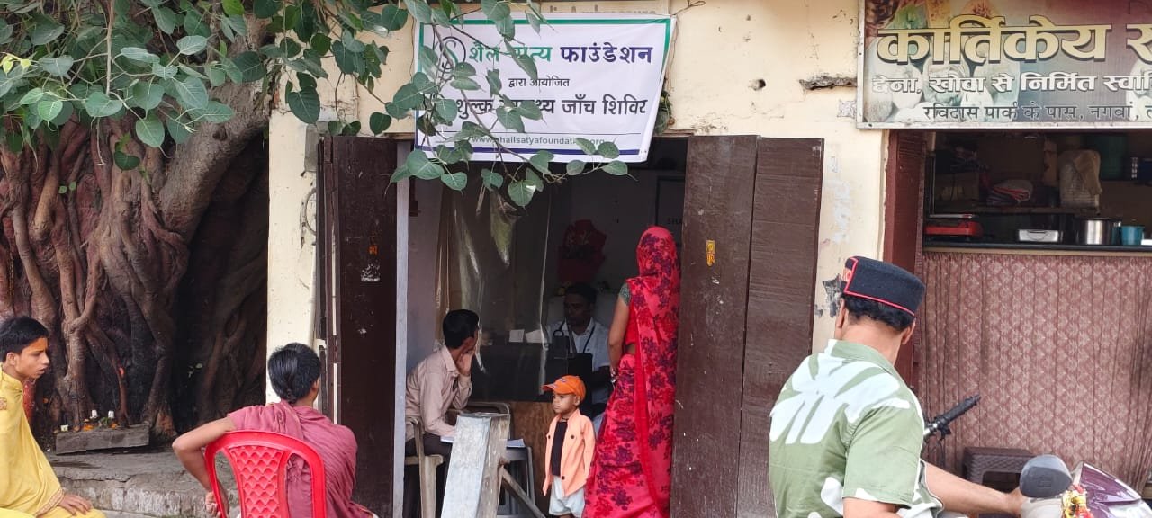 Doctor examining patient at SSF free health camp