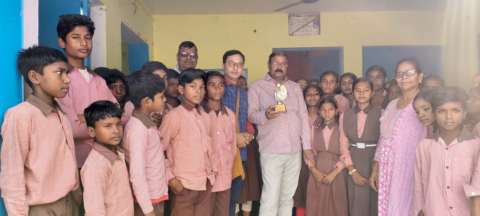 SSF team with students and teachers at a school visit