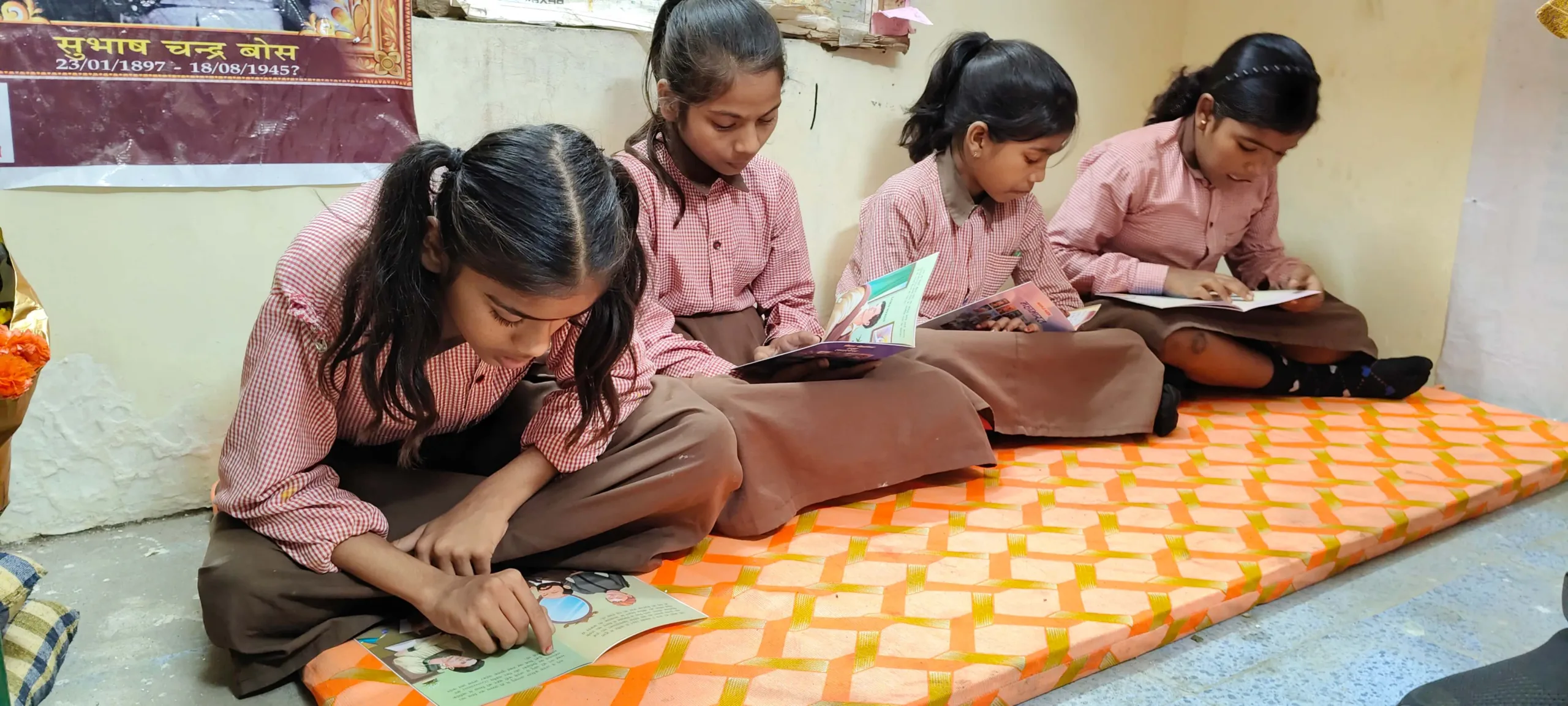 Children reading book: Shail-Satya Foundation