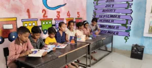 Students reading books in a library established under Shail-Satya Foundation’s “Dosti Kitabon Se” campaign, promoting Children’s Day 2025 education initiatives.