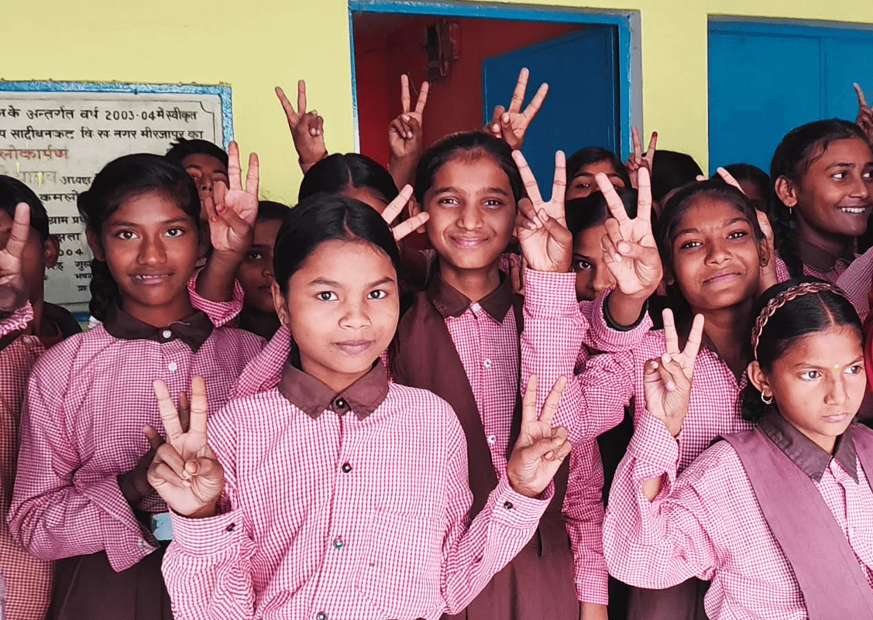 Children happy after getting books from Shail-Satya Foundation